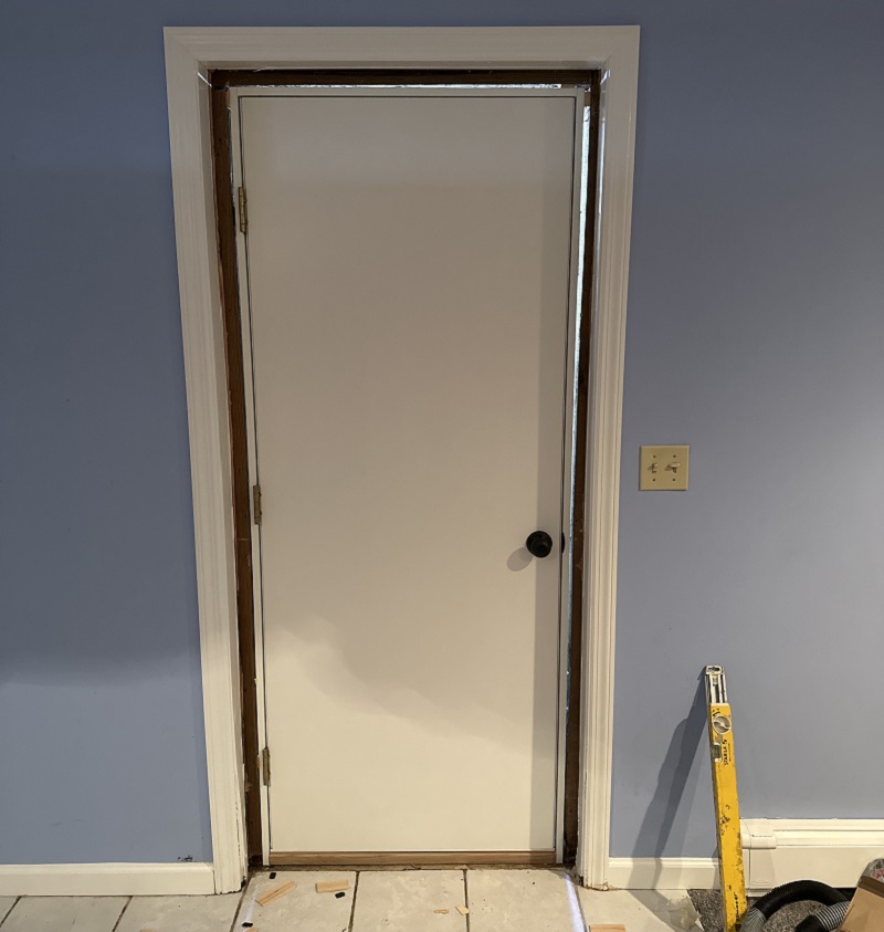 This new Therma Tru fiberglass door will help keep this basement warm